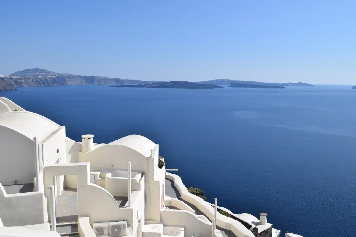 stunning sea view, volcanic cliff, white traditional houses in Santorini