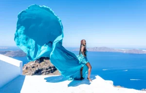 Santorini photography tours woman in long blue dress